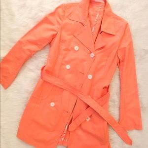 Pastel orange trench coat
